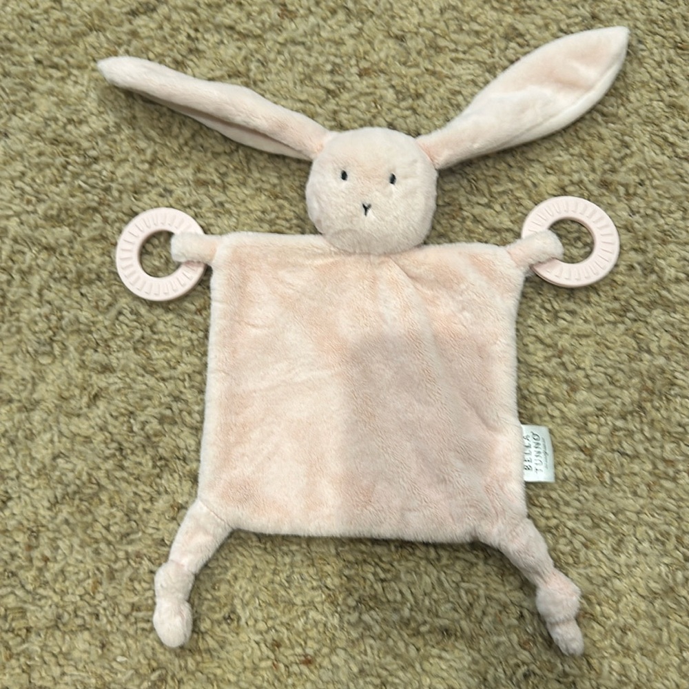 Like New Bella Tunno bunny lovie with teething rings. We never used it.